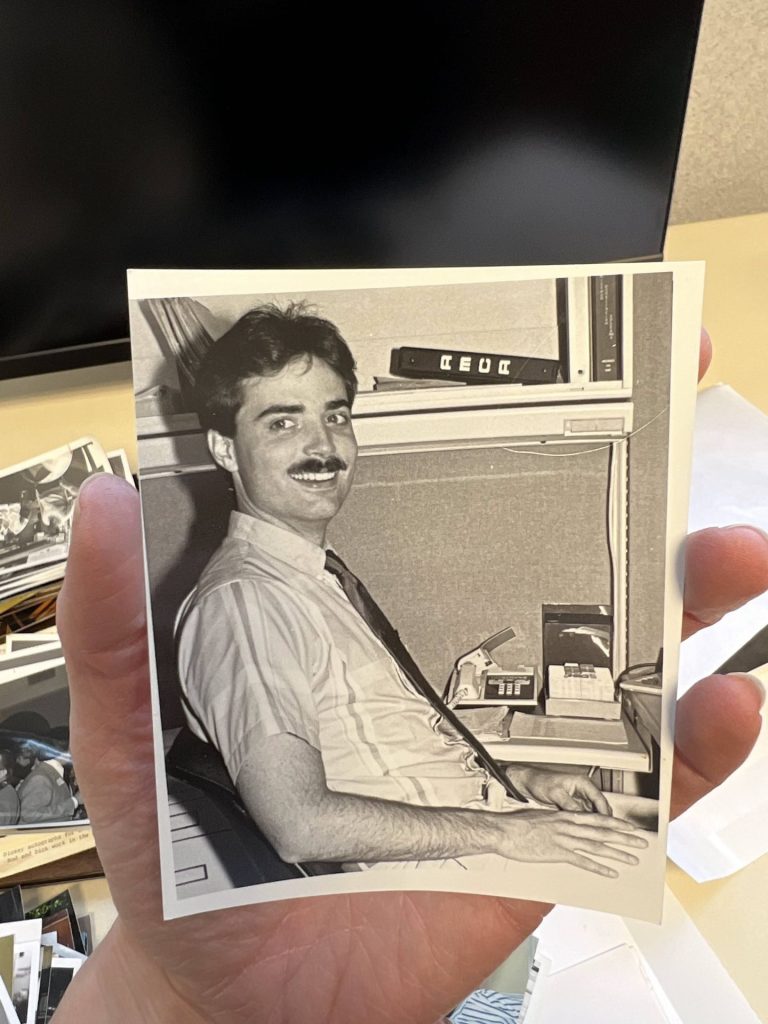 vintage photo of a man at a desk